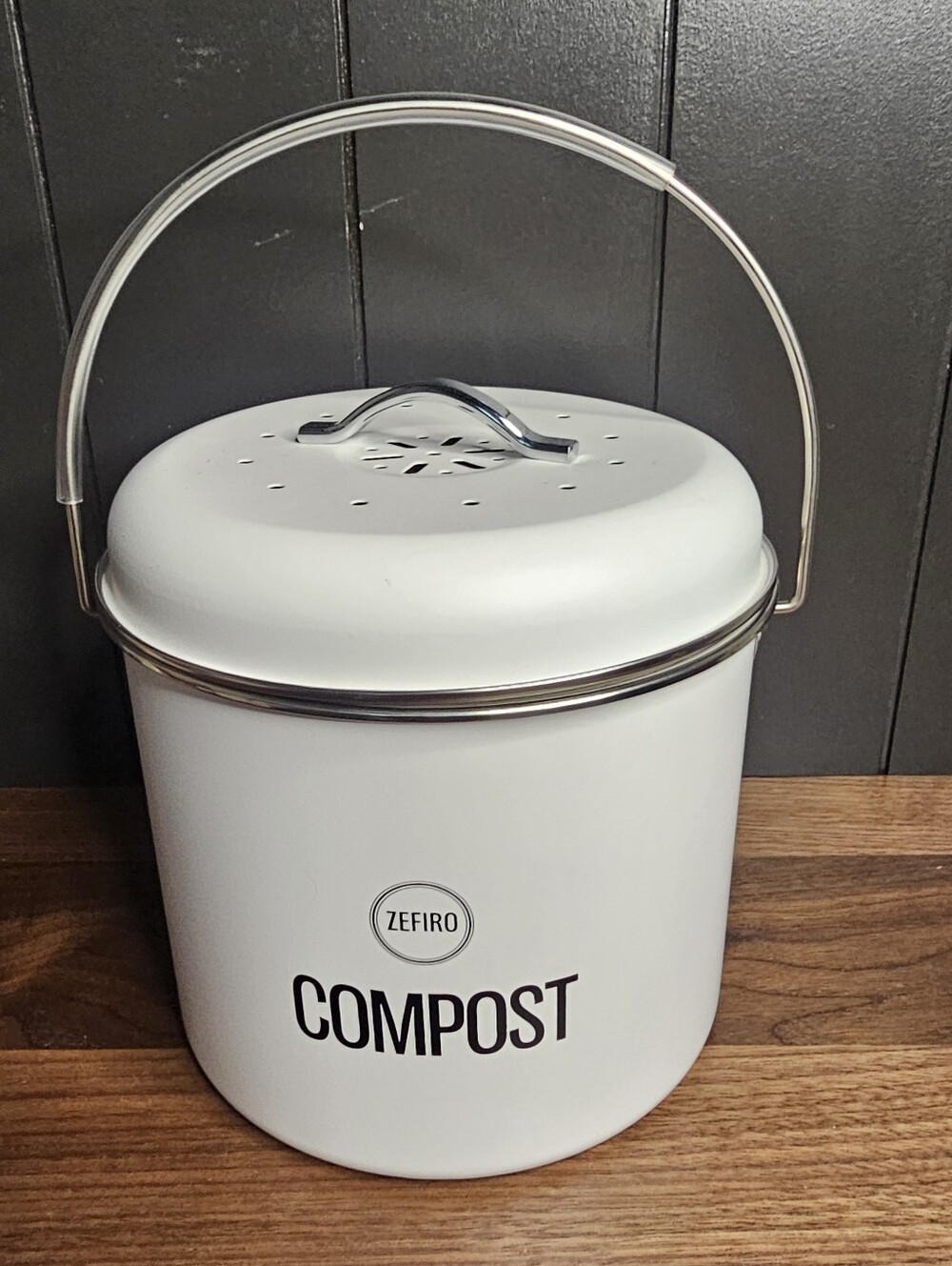 Zefiro brand stainless steel compost bin with a 0.8-gallon capacity.